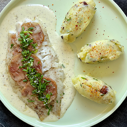 Filets de Tacaud à l’andouille de Vire, crème au pommeau de Normandie