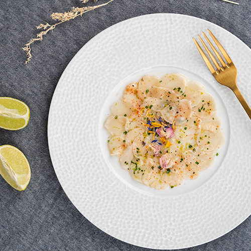 Carpaccio de noix de Saint-Jacques au vinaigre de cidre